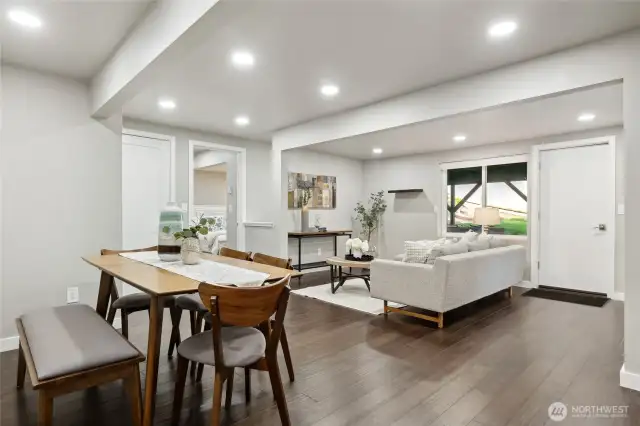 lower-level Media room, dining area and door to rear yard