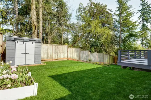 Enjoy a large private deck & fenced yard, potting or storage shed and herb garden...