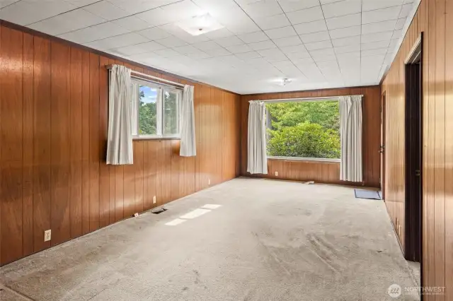 Spacious living room with large windows
