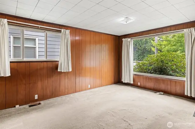 Spacious living room with large windows