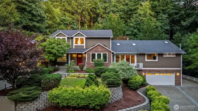 Immense curb appeal & additional RV or boat parking to the right