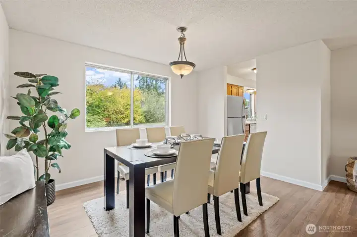 The formal dining room is right off the kitchen for easy access when entertaining and is also open to the living room. This is a great space for friends and family to gather.