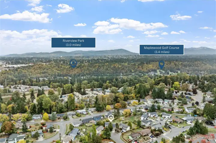 Enjoy views of nearby forested hills with Riverview Park and Maplewood Golf Course just a short drive away. Nestled in a peaceful residential pocket with easy access to outdoor recreation.