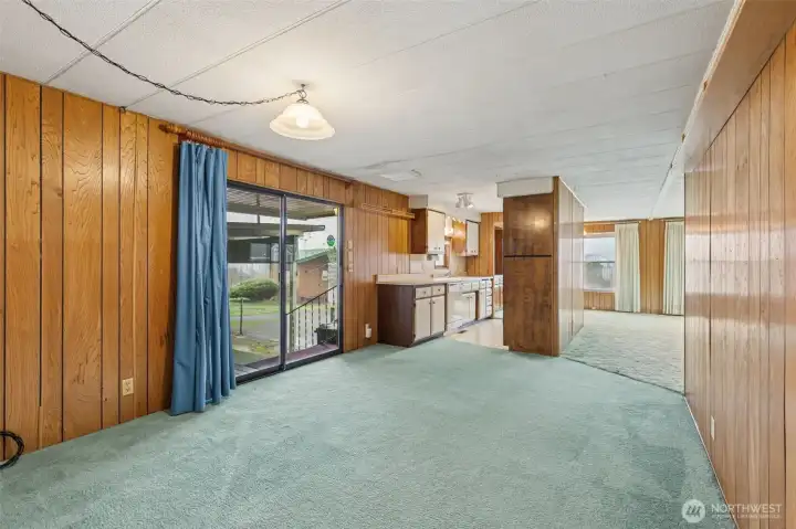 Here is the family room w/a view of the kitchen.