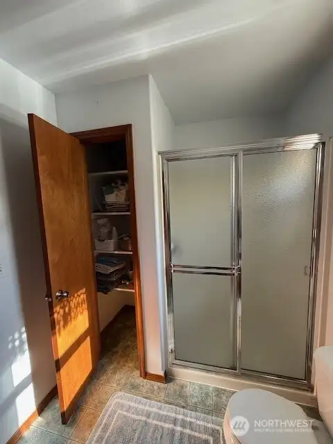 Large linen closet for storage.