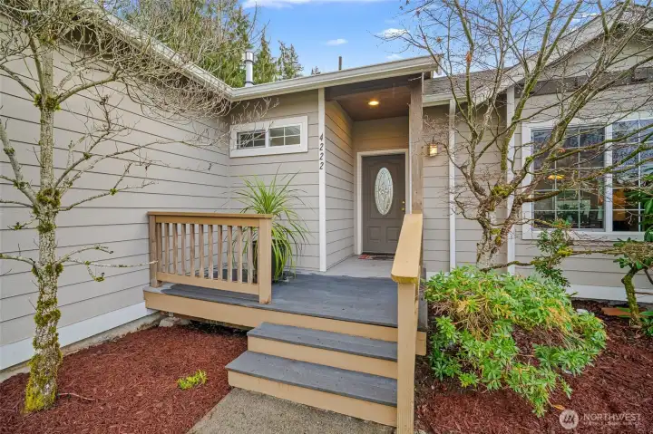 Charming covered front porch entry.
