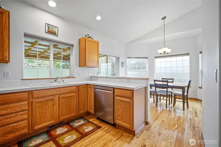 Open kitchen and dining area offers a convenient flow for everyday living and entertaining.