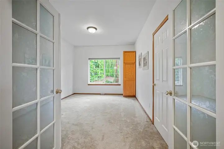 Third Bedroom can be used as an office or den with its double glass doors.