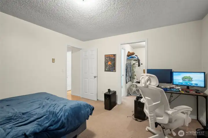 Main room with walk in closet and second bathroom