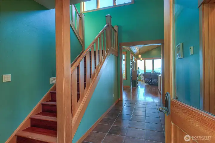 Entryway into main house, stairway up to second level bedroom/bath and large walk-in closet area.