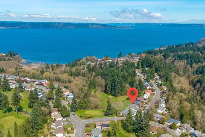 Spectacular view overlooking the Twin Lakes golf course with Sound view.