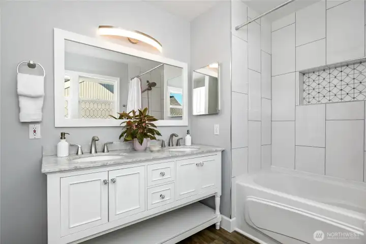 Primary bath on main with granite and luxury finishes