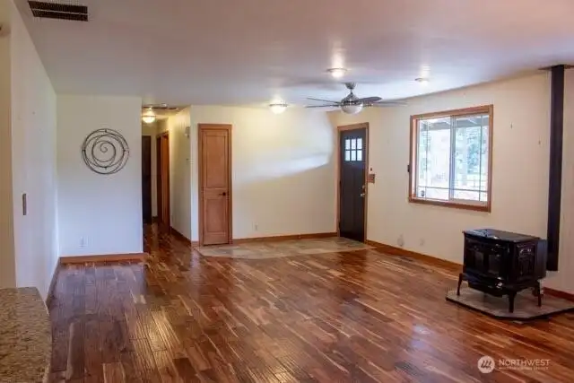 Warm, inviting entry with hardwood and tile floors Warm, inviting entry with hardwood and tile floors