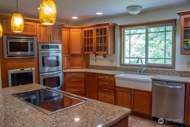 Large, basin sink, quartz countertops, so much storage and look at all the ovens (more than double ovens)! Large, basin sink, quartz countertops, so much storage and look at all the ovens (more than double ovens)!