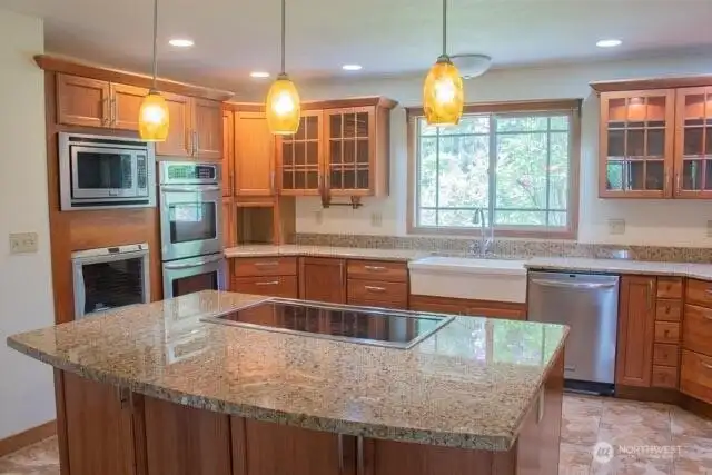 Large island and warm lighting too! Large island and warm lighting too!
