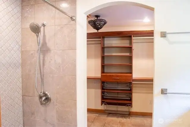 Shower looking beyond to the California closets Shower looking beyond to the California closets