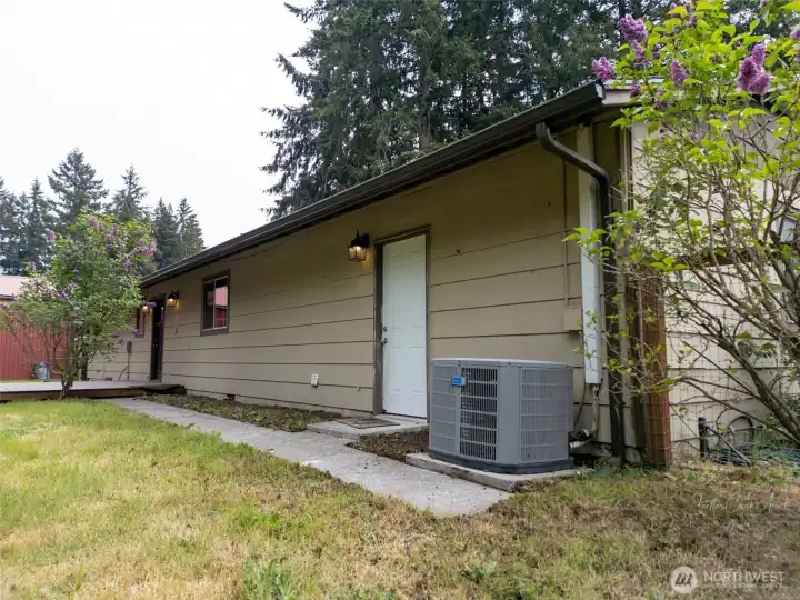 Heat pump and back yard path Heat pump and back yard path