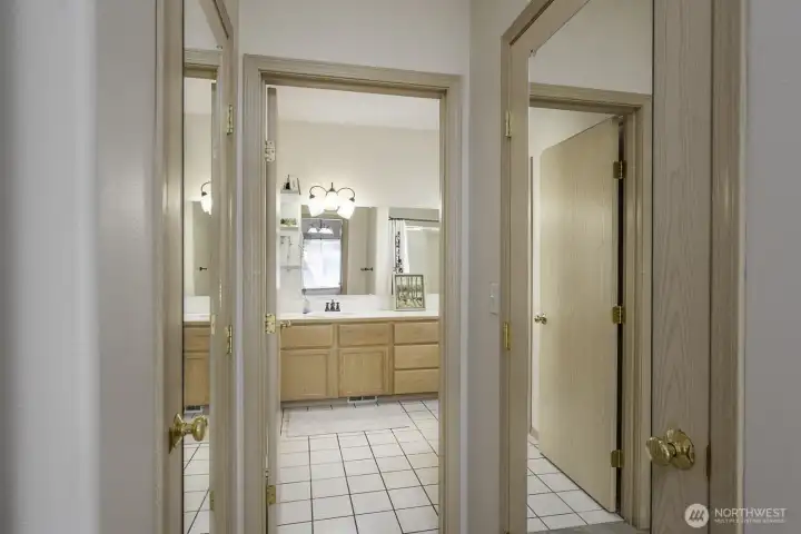 two large closets before entering into the ensuite bathroom