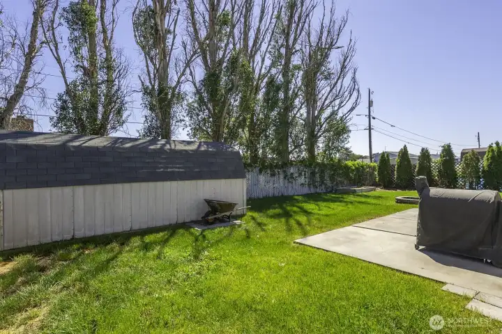 Large storage shed still leaves plenty of space in the yard