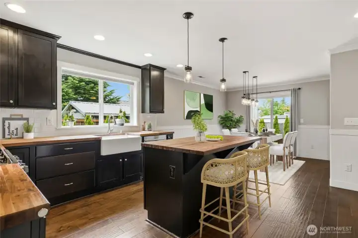 Extra-large windows enhance brightness, and an open-concept kitchen-and-dining-room floor plan supports everyday living. Extra-large windows enhance brightness, and an open-concept kitchen-and-dining-room floor plan supports everyday living.