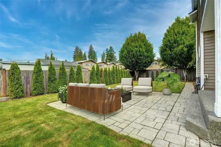 Custom concrete-tiled patio for BBQ fun and evening stargazing. Custom concrete-tiled patio for BBQ fun and evening stargazing.