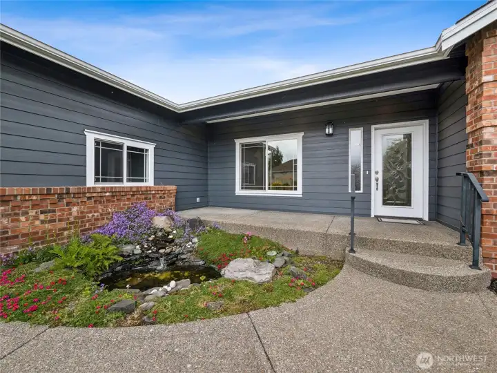 The soothing sounds of the waterfall creates an inviting and picturesque arrival. The soothing sounds of the waterfall creates an inviting and picturesque arrival.