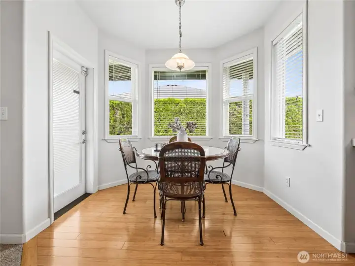 Comfortable breakfast nook positioned just off the kitchen, with a door nearby leading to the outdoor patio. Comfortable breakfast nook positioned just off the kitchen, with a door nearby leading to the outdoor patio.