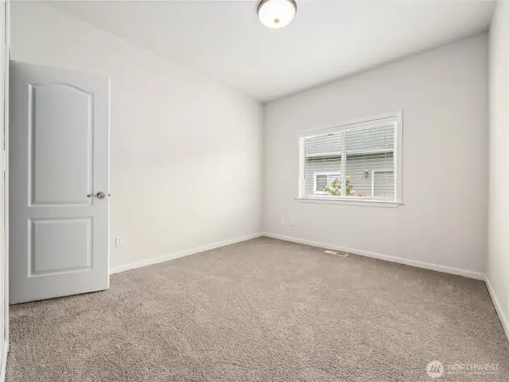 Additional bedroom. New carpeting has been installed throughout the home. Additional bedroom. New carpeting has been installed throughout the home.