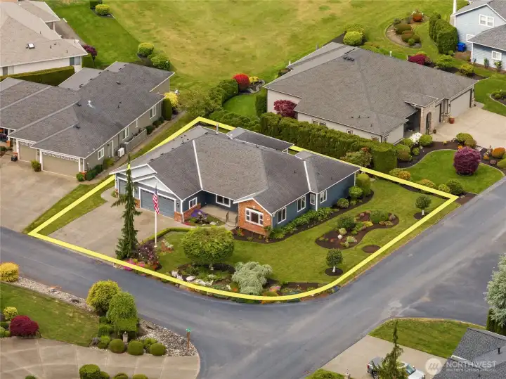 Desirable corner lot with manicured landscaping and a polished, inviting exterior presence. Desirable corner lot with manicured landscaping and a polished, inviting exterior presence.