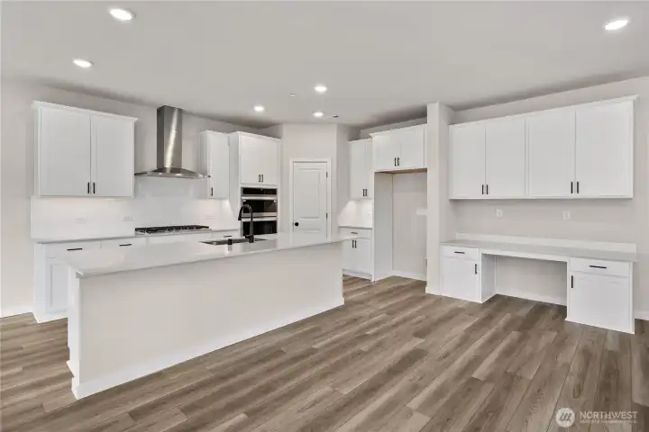 Oversized kitchen w gas range! Actual colors and finishes may vary. See site agent for details.