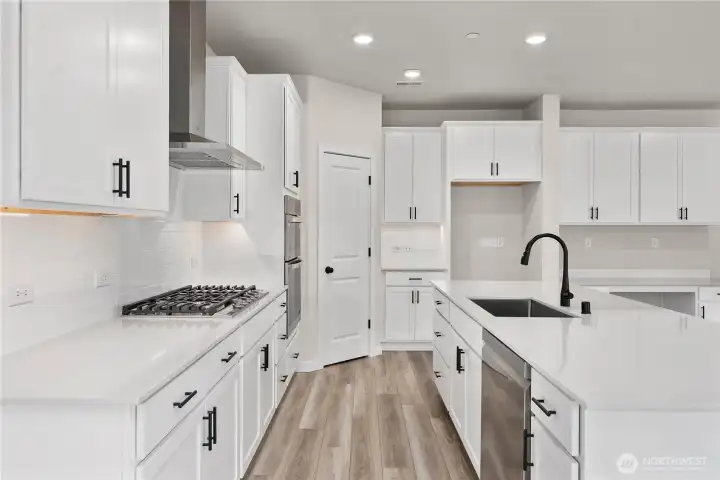Photos of a previously completed home. Actual colors and finishes may vary. See site agent for details.