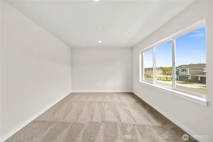 Bonus Room Upstairs. Photos of a previously completed home. Actual colors and finishes may vary. See site agent for details.