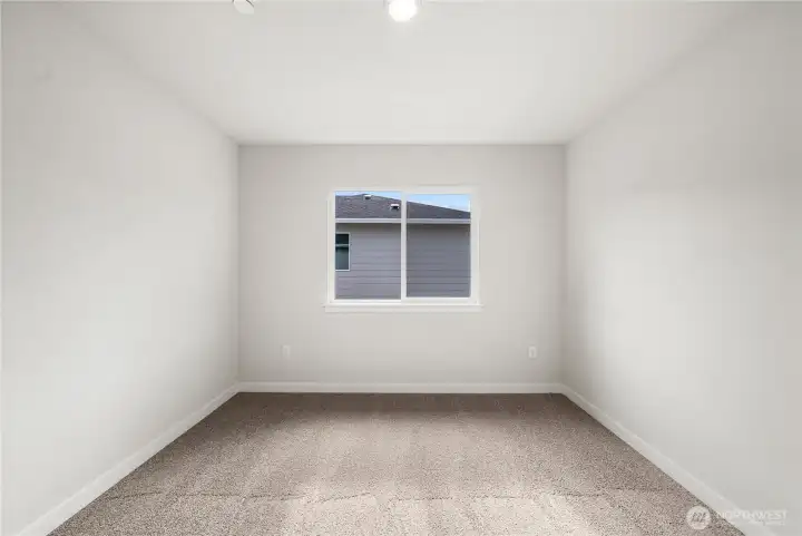 Bed 4. Photos of a previously completed home. Actual colors and finishes may vary. See site agent for details.