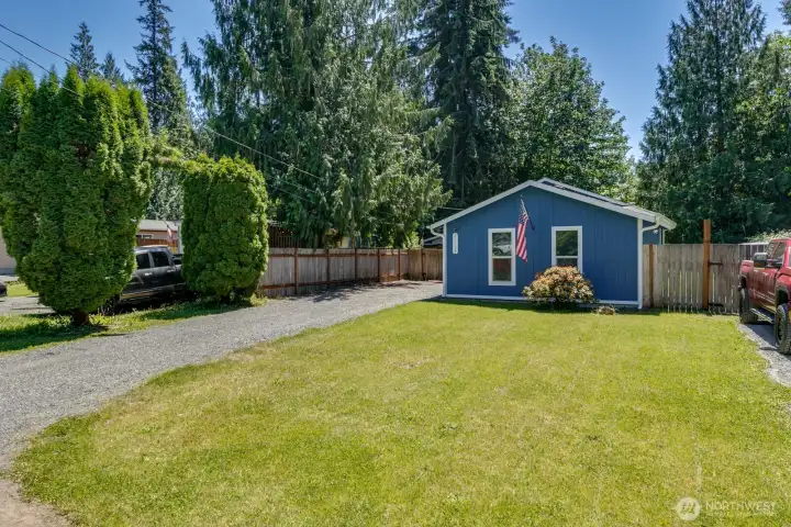 Additional driveway to the right of the yard (see red tuck) - RV, Boat, Cars.
