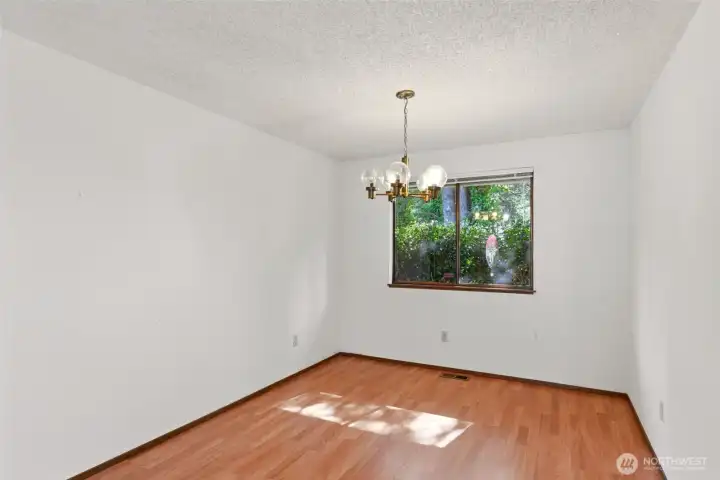This dining area sits adjacent to the kitchen.