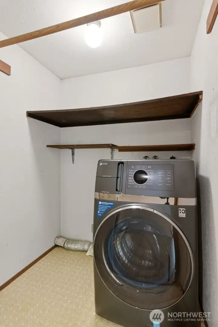This combo washer/dryer unit is included with the home.