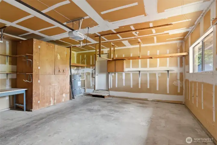 Shelves and cabinets for storage are included.