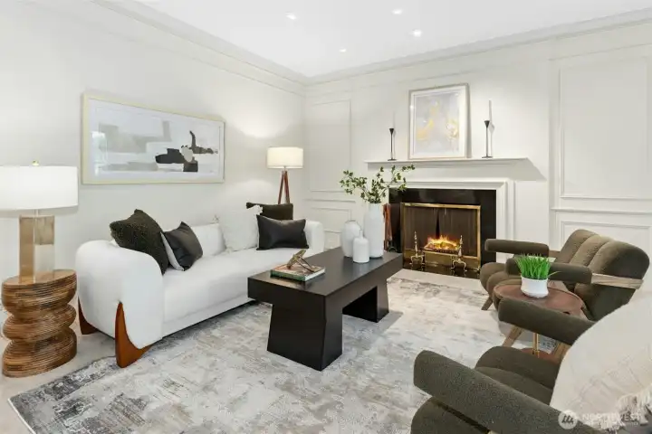 Freshly painted formal living room features propane fueled fireplace.