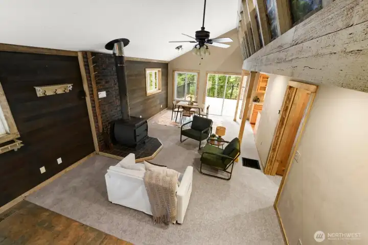 Large windows bring the outdoors inside. Forest views surround the home, creating a peaceful setting in every season. Large windows bring the outdoors inside. Forest views surround the home, creating a peaceful setting in every season.