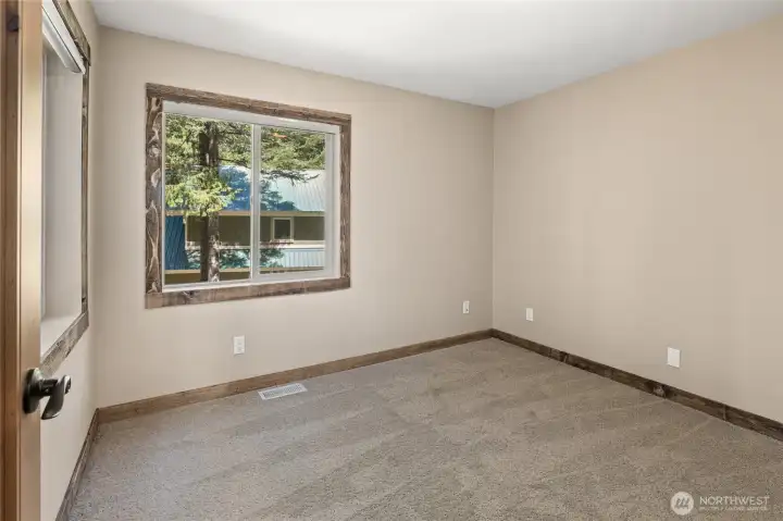 Flexibility is one of this cabin's greatest features. Create a home office, playroom, craft room, or an extra bedroom for guests. Flexibility is one of this cabin's greatest features. Create a home office, playroom, craft room, or an extra bedroom for guests.