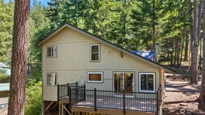 Recent deck improvements create even more usable outdoor living space while blending beautifully with the natural surroundings. Recent deck improvements create even more usable outdoor living space while blending beautifully with the natural surroundings.
