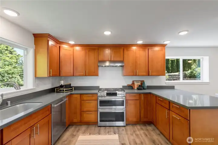 Huge kitchen with ample cabinet space and countertops. Huge kitchen with ample cabinet space and countertops.