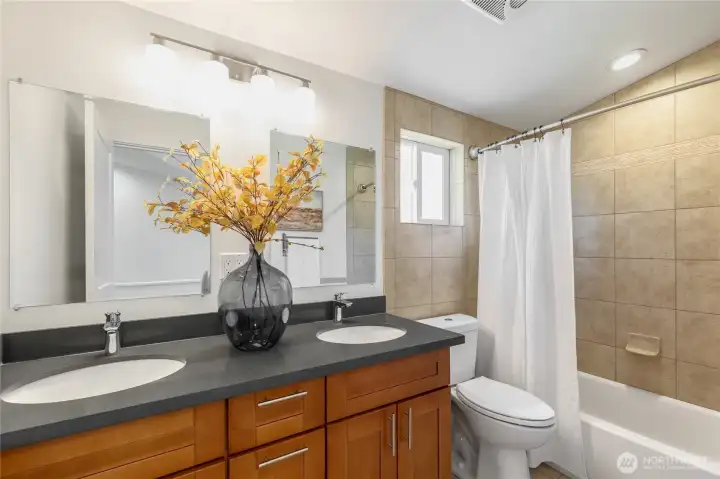 Full bathroom upstairs with double vanity Full bathroom upstairs with double vanity