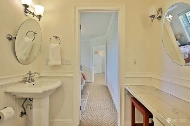 Primary bedroom is in the distance and the family room is to the right of the bedroom.