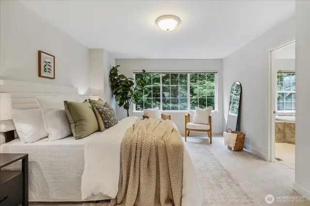 Large Primary Suite with en-suite bath, green views make this space filled with tranquility.