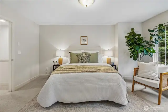 Light filled and generously-sized Primary suite.