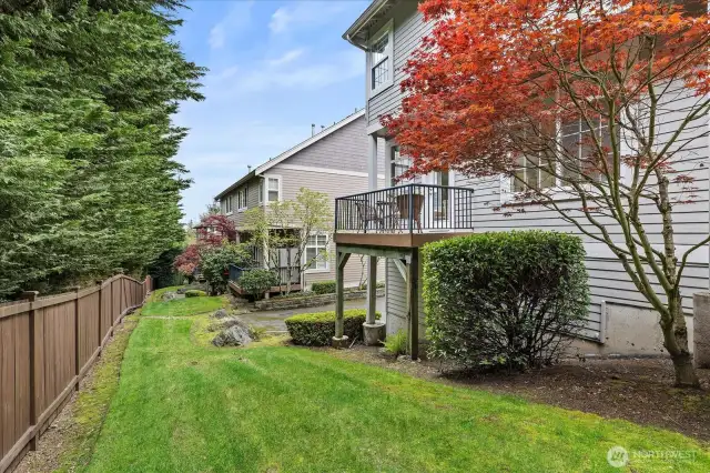 Nice deck with green views and the lawn is maintained by the HOA!