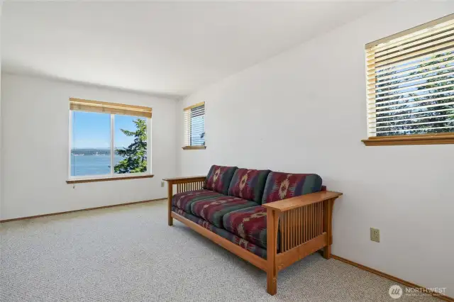 Upstairs bedroom #2, has lots of natural light with amazing water & mountain views as well.
