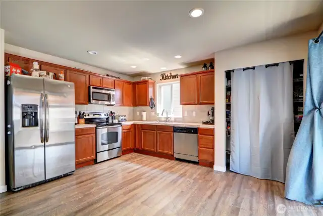 Spacious kitchen with pantry and dining space