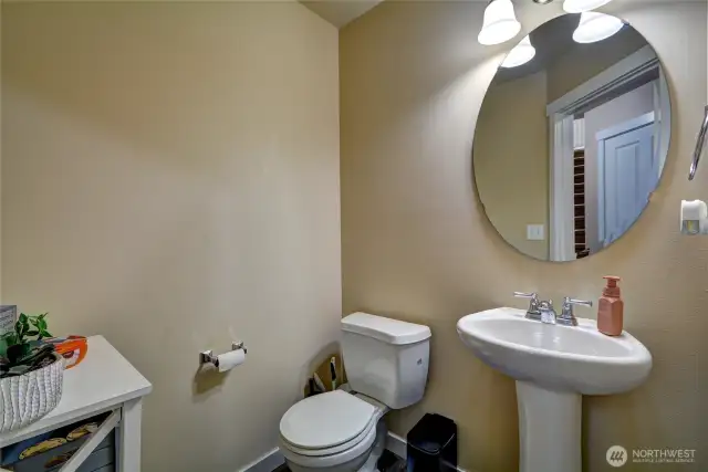 1/2 bath conveniently located on the main level for guests.